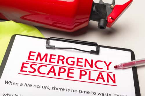 clipboard that reads "emergency escape plan"