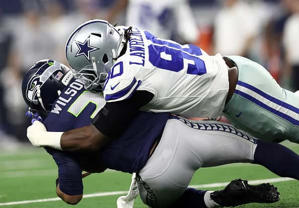 People: Demarcus Lawrence, Russell Wilson:Getty Images