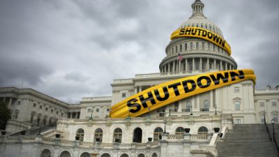 Federal Building With Sign "Shutdown"