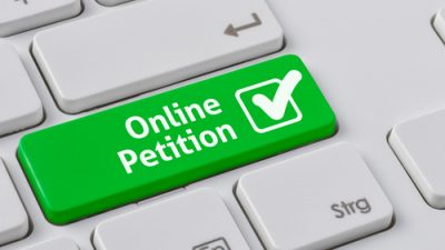 Keyboard with the words: "Online Petition" highlighted
