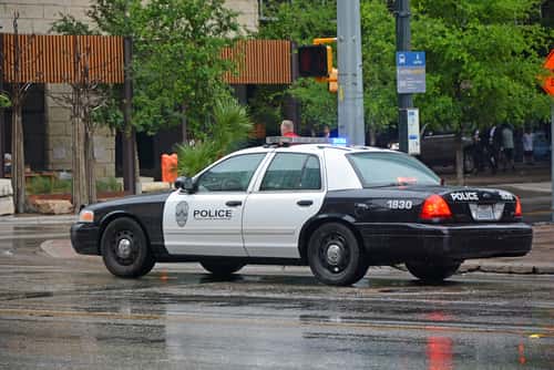 Austin Police Car on a rainy street