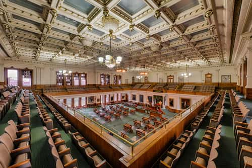 Wide-angle shot inside the Texas Senate chambers