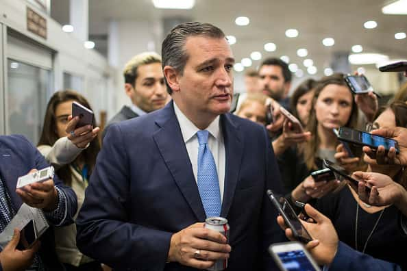 Senator Ted Cruz standing with reporters