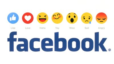 Facebook logo with emoticons