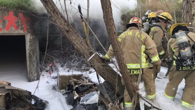Austin fire fighters responding to a series of drainage tunnel fires