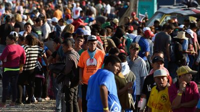 Central American migrants, taking part in a caravan heading to the US