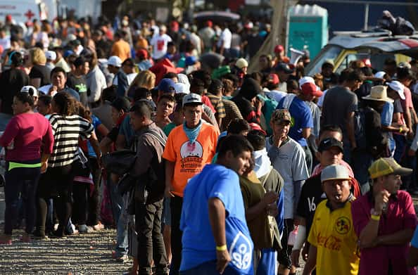 Central American migrants, taking part in a caravan heading to the US