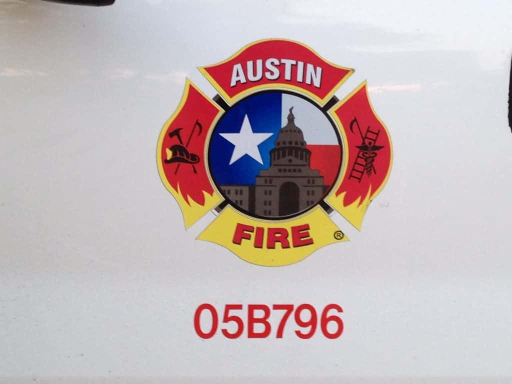 Austin Fire Department insignia on a vehicle door