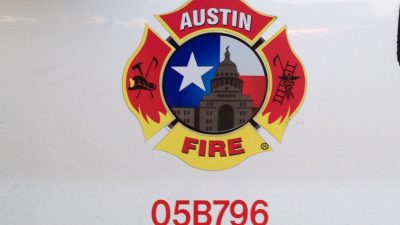 Austin Fire Department insignia on a vehicle door