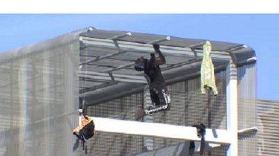 Statue of Liberty climber climbed the top of the Southwest Key Building protesting in Austin