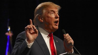 Trump speaking at podium