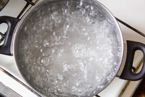 Water boiling in a pot on a stove