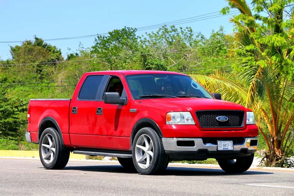 Red Ford F-150 pick-up truck