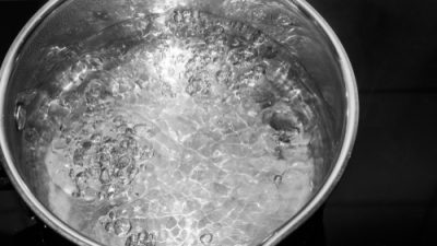 Water boiling in a pot on a stove