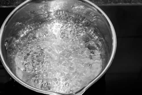 Water boiling in a pot on a stove
