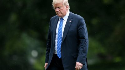 President Trump walking on White House lawn