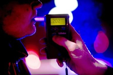 Breathalyzer test being performed