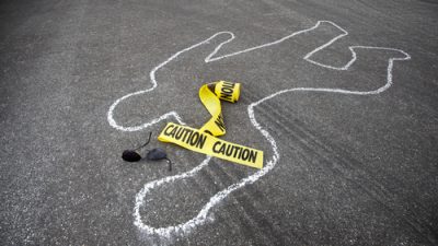 Chalk outline of body with caution tape