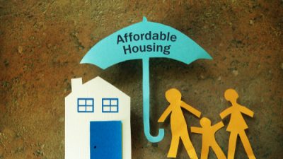 Cutouts of family for Affordable Housing