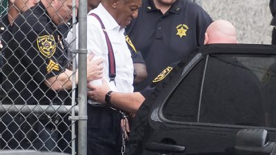 Bill Cosby in handcuffs leaving the courthouse after being sentenced to jail
