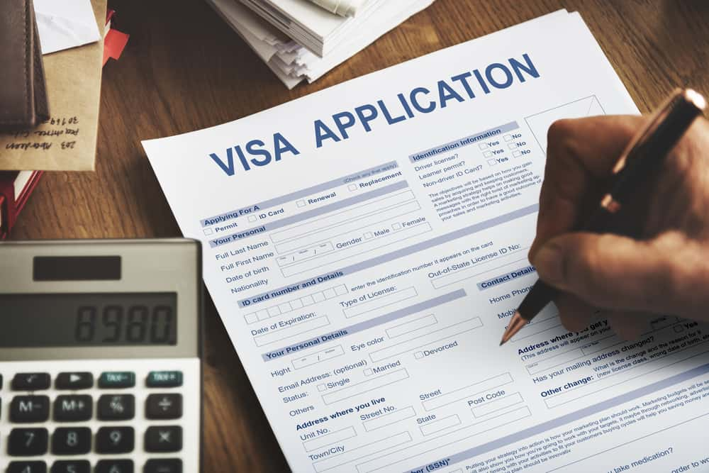 depiction of filling out a visa application