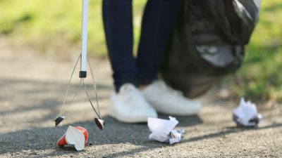 Person picking up trash