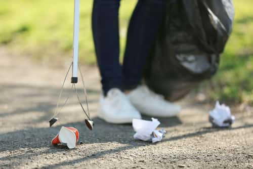 Person picking up trash