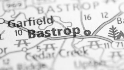 Man in Bastrop dies after being struck by truck without a driver