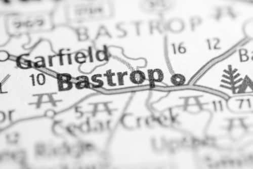 Man in Bastrop dies after being struck by truck without a driver