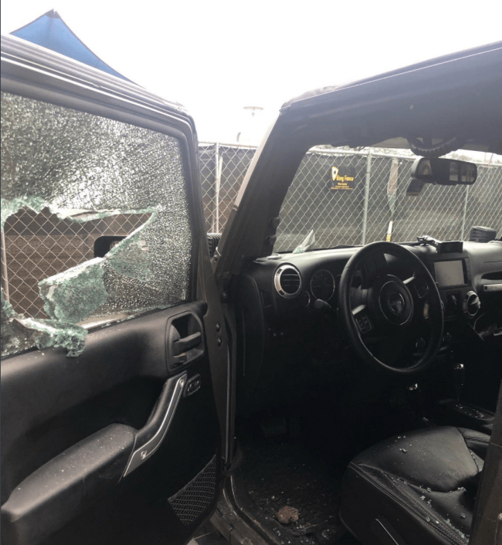 GP Bush's Jeep window smashed in