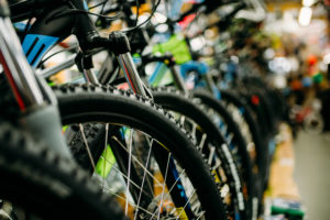 bicycles lined up in a shop