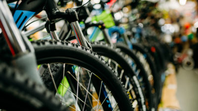 bicycles lined up in a shop