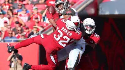 Arizona Cardinals strong safety Budda Baker (32) tries to break up the pass. Nov 10^ 2019; Tampa^ FL USA;