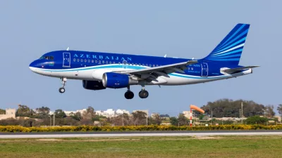 Azerbaijan Airlines Airbus A319-111 (REG: 4K-AZ05) on finals runway 31^ bringing the national football team for a match with Malta. Luqa^ March 23^ 2022