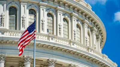 Washington DC Capitol dome detail with waving americanstar and stripes flag