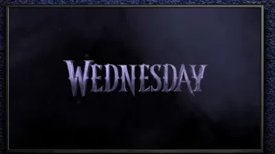 TV on black wall. TV screen playing Wednesday trailer or movie. Moscow^ Russia - December 5^ 2022.