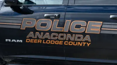 Sign on Anaconda Deer Lodge County police car in closeup. Anaconda^ MT^ USA - May 6^ 2025