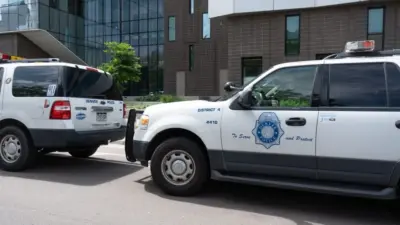 Law Enforcement Downtown Denver^ Denver Police Department cars parked Denver^ Colorado^ United States - 5.17.2023