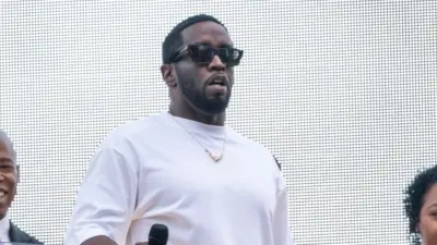 Sean "Diddy" Combs speaks and performs to the crowd after being presented with the key to the city by Mayor Eric Adams on Times Square in New York on September 15^ 2023