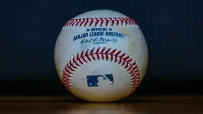 Baseball with 'Official Major League Baseball' Inscription and Blue MLB Batter Silhouette Logo