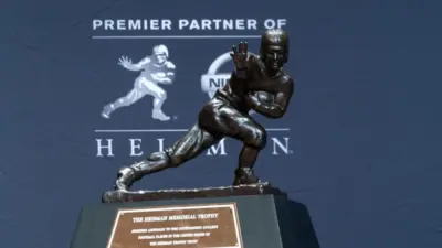 New York^ NY - December 14^ 2019: Heisman Memorial Trophy trophy on display at the Marriott Marquis Hotel