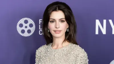 Anne Hathaway wearing dress and shoes by Valentino attends presentation of movie Armageddon Time during 60th New York Film Festival at Alice Tully Hall on October 12^ 2022