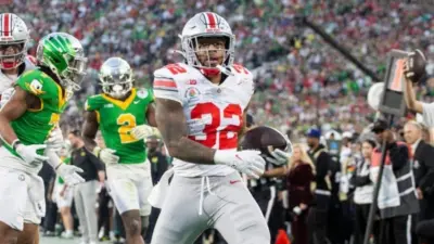 Ohio State running back TreVeyon Henderson #32 scores a touchdown against Oregon during the 2025 Rose Bowl game Wednesday^ Jan. 1^ 2024^ in Pasadena^ Calif.