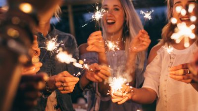 Friends having fun with sparklers