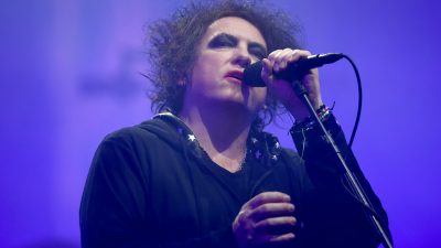 The Cure frontman singing