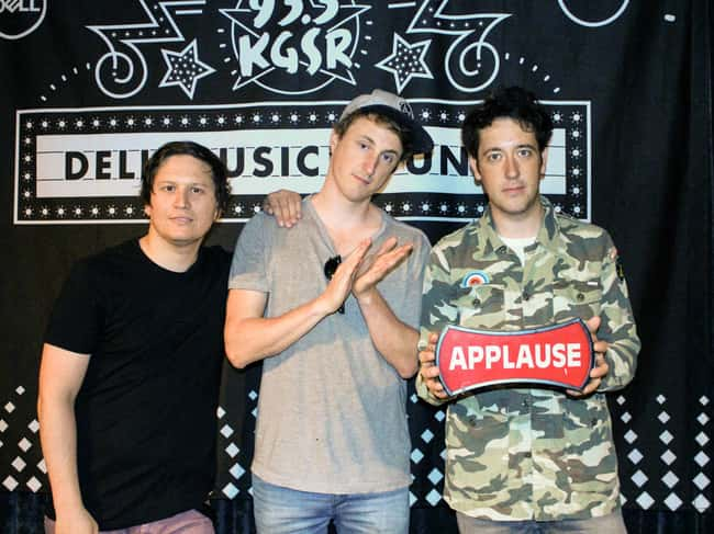 The Wombats in the Dell Music Lounge holding applause sign