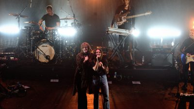 Maggie Rogers and Florence Welch on Stage