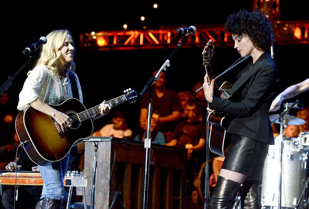 Sheryl Crow and St. Vincent on stage in 2015