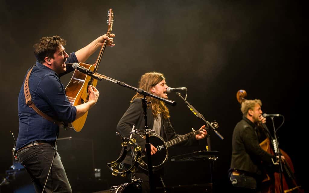 Mumford and Sons performing on stage