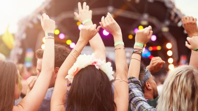 Women in a crowd at a music festival